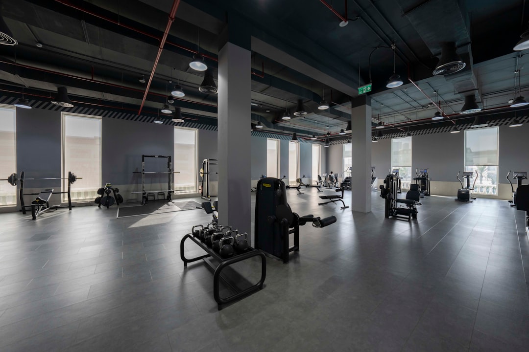 A large gym with a lot of machines